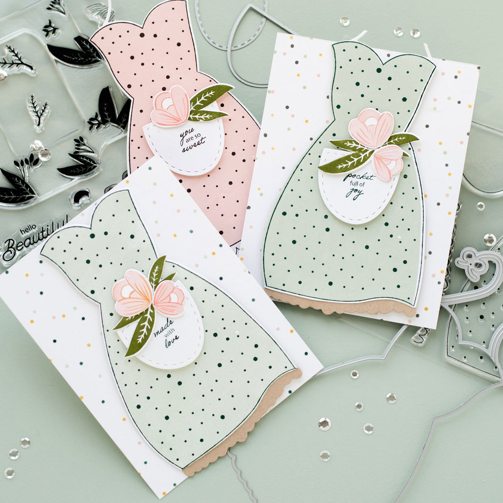 Trio of handmade cards, featuring the Apron Strings stamps and dies, on a polka dot background using the Bitty Dot Stencil. Pockets adorned with Hello Beautiful Blooms florals and sentiments from Pocketful of Joy.